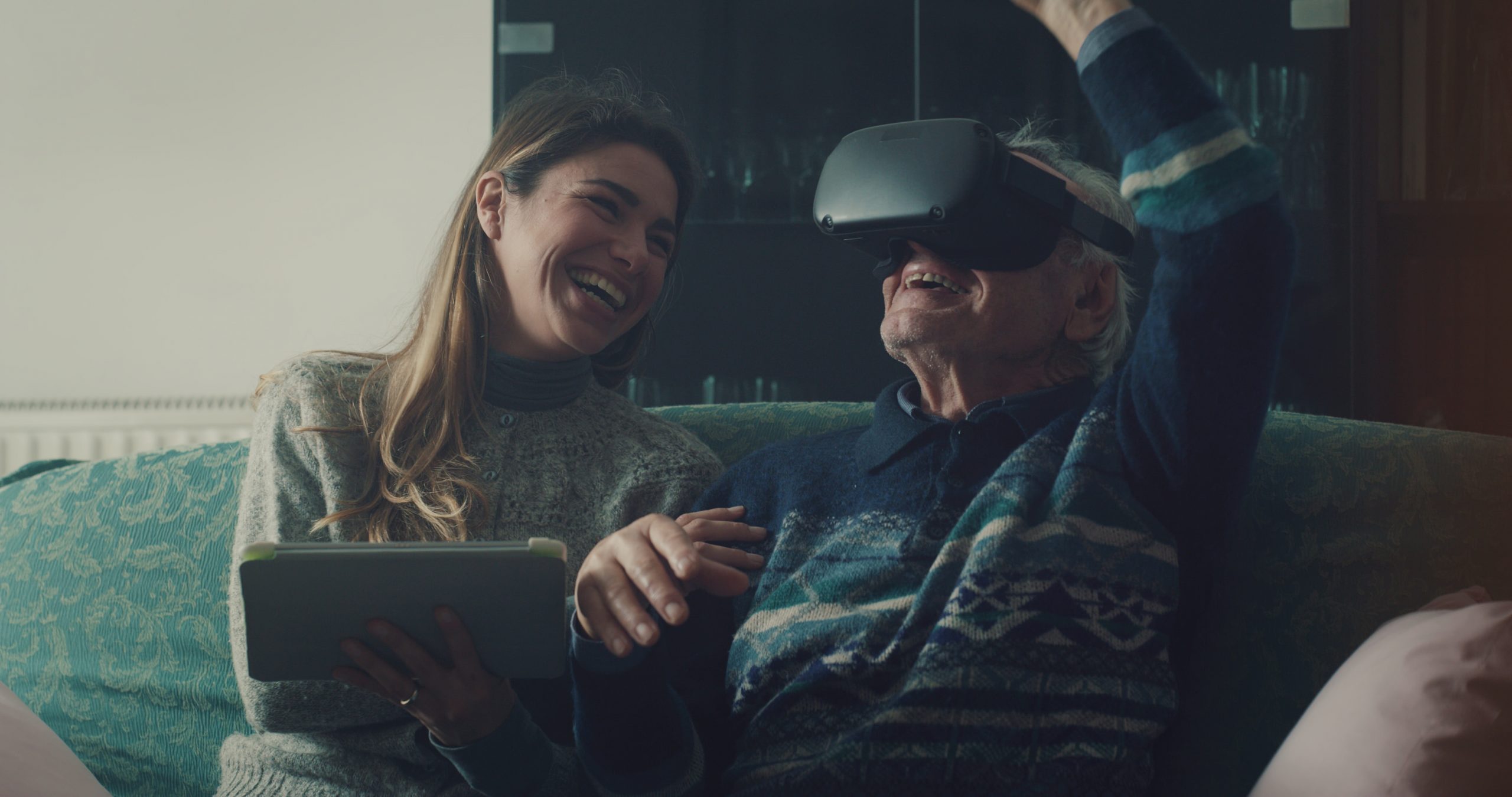 Cinematic Shot Of Senior Grandfather With Vr Glasses and Granddaughter